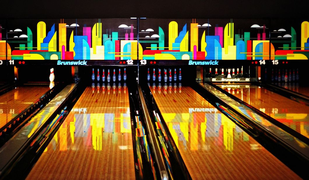 A bowling alley with lots of pretty lights