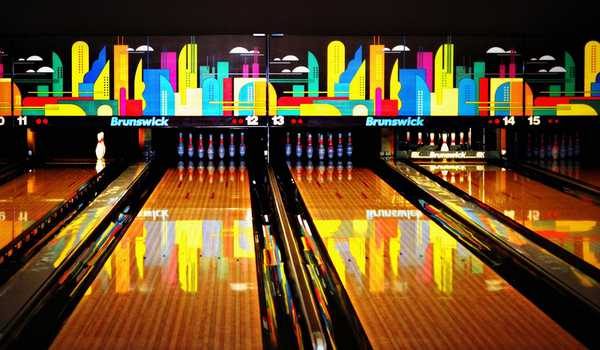 A bowling alley with lots of pretty lights