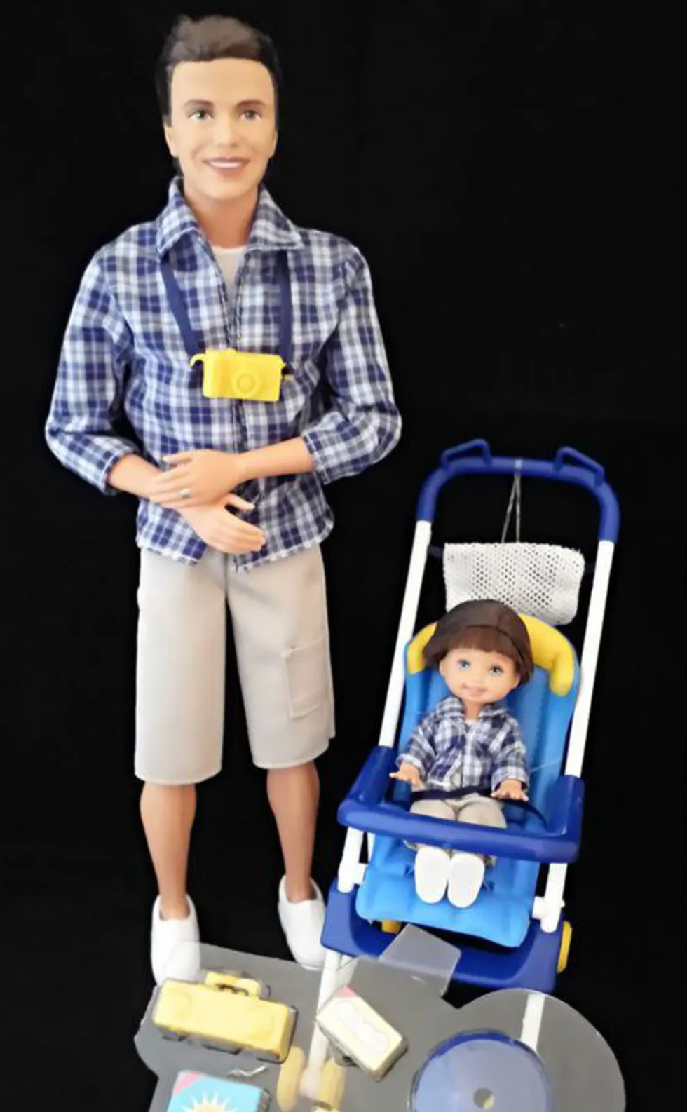 A Dad Barbie with his child
