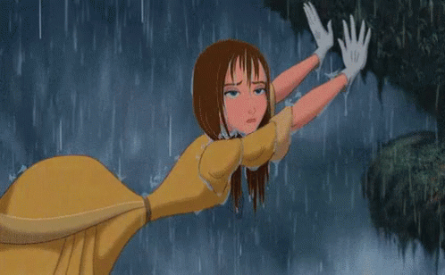 A gif of a woman outside in the rain