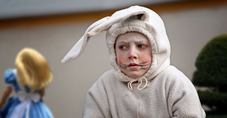 A little girl dressed in a bunny costume