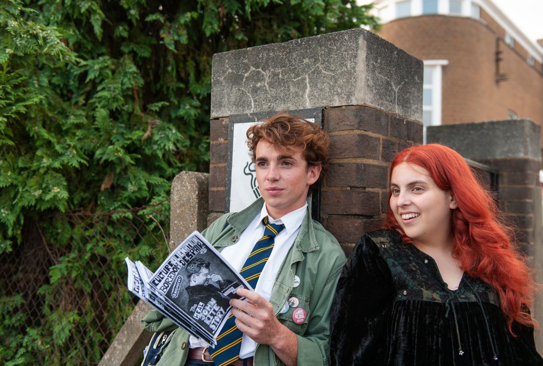 A movie still of Laurie Kynaston (left) and Beanie Feldstein (right) in "How to Build a Girl."