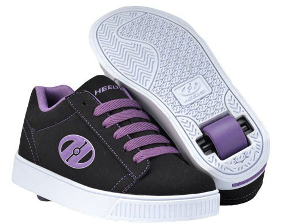 A paid of black and purple heelys