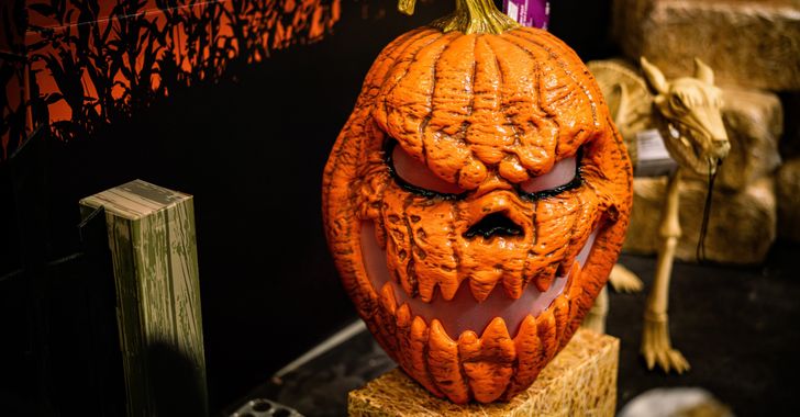 a pumpkin carved to look like a scary face