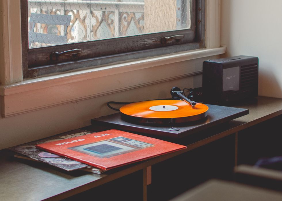 A record player with a record in it.