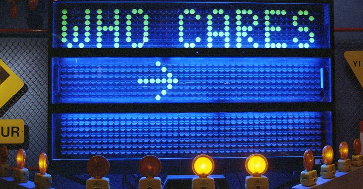 a sign that is lit up in the dark