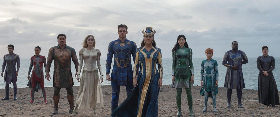 A still image from Marvel's "Eternals" including (left to right) Lauren Ridloff (Makkari), Ma Dong-seok (Gilgamesh), Angelina Jolie (Thena), Richard Madden (Ikaris), Salma Hayek (Ajak), Gemma Chan (Sersi), Lia McHugh (Sprite) and Brian Tyree Henry (Phastos).
