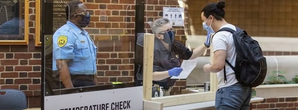 A student at Michigan State University is receiving a coronavirus test.