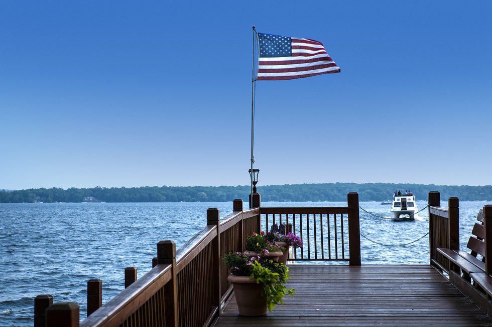 an image of the united states flag and a body of water