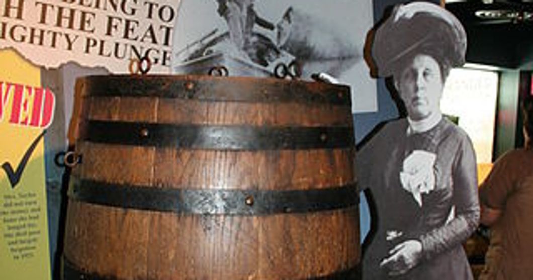 Annie Edson Taylor next to barrel