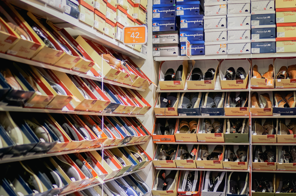 assorted pairs of shoes on boxes