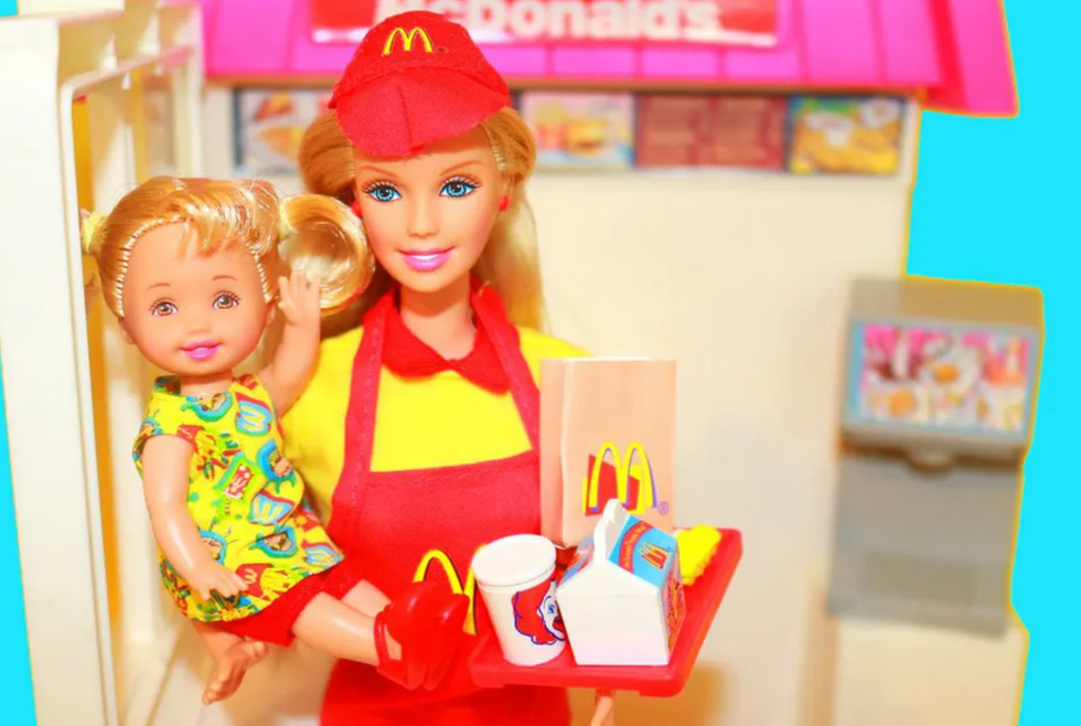 Barbie in McDonalds uniform with baby Kelly