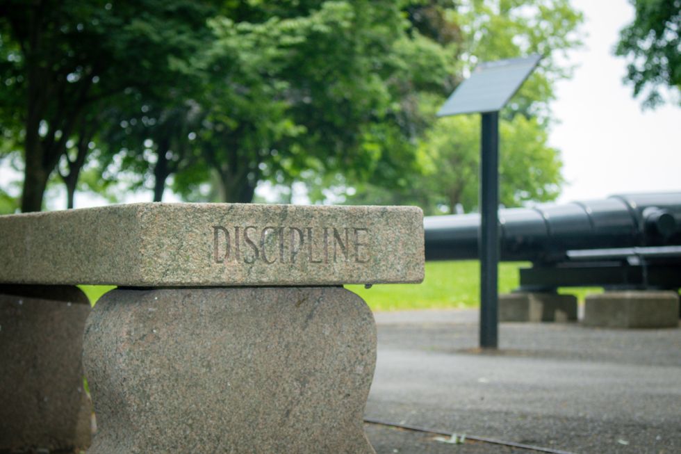 Bench with the word discipline wrote on it