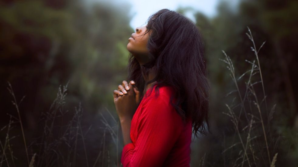 black christian woman praying
