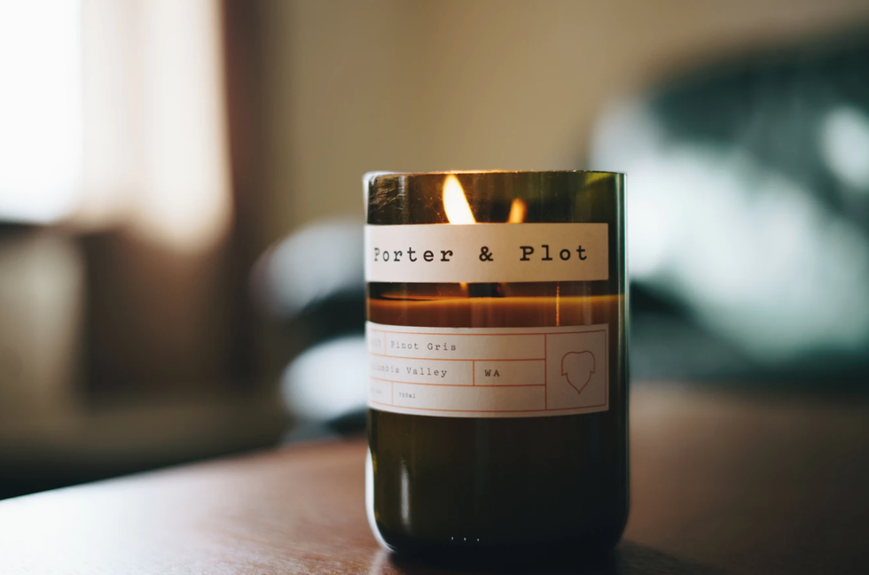 black votive candle shallow focus photography