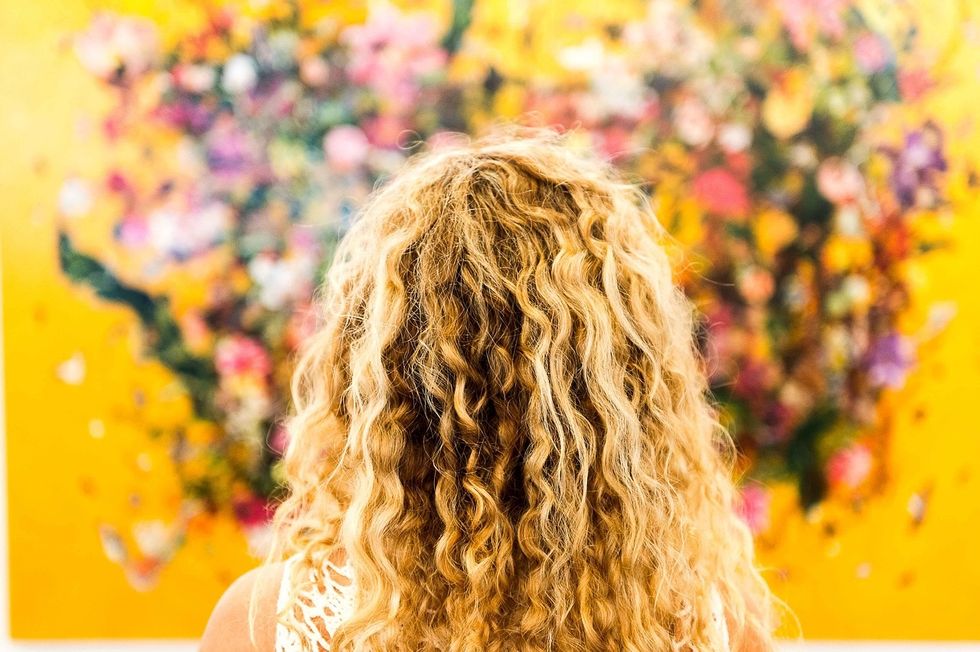 Blonde curly haired woman 