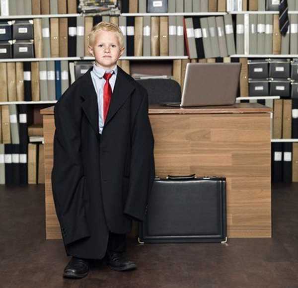 boy in adult clothes