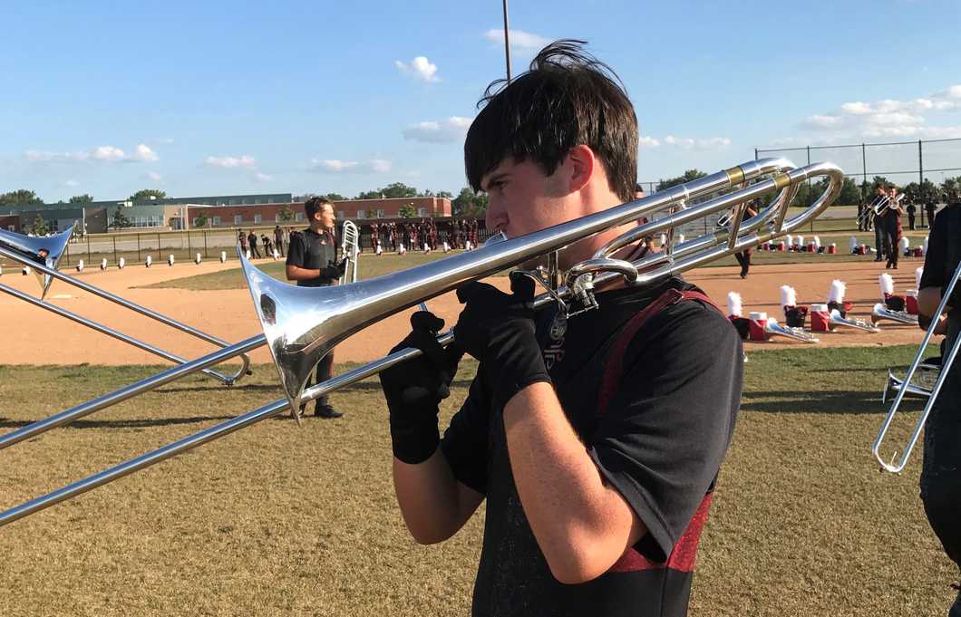 boy playing trombone