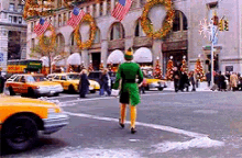 Buddy The Elf being hit by a taxi