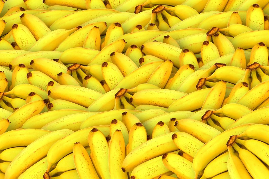Bunches of bananas on top of each other