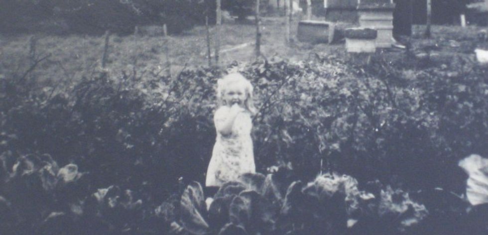 child in a garden