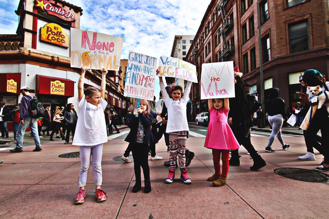 children holding signs