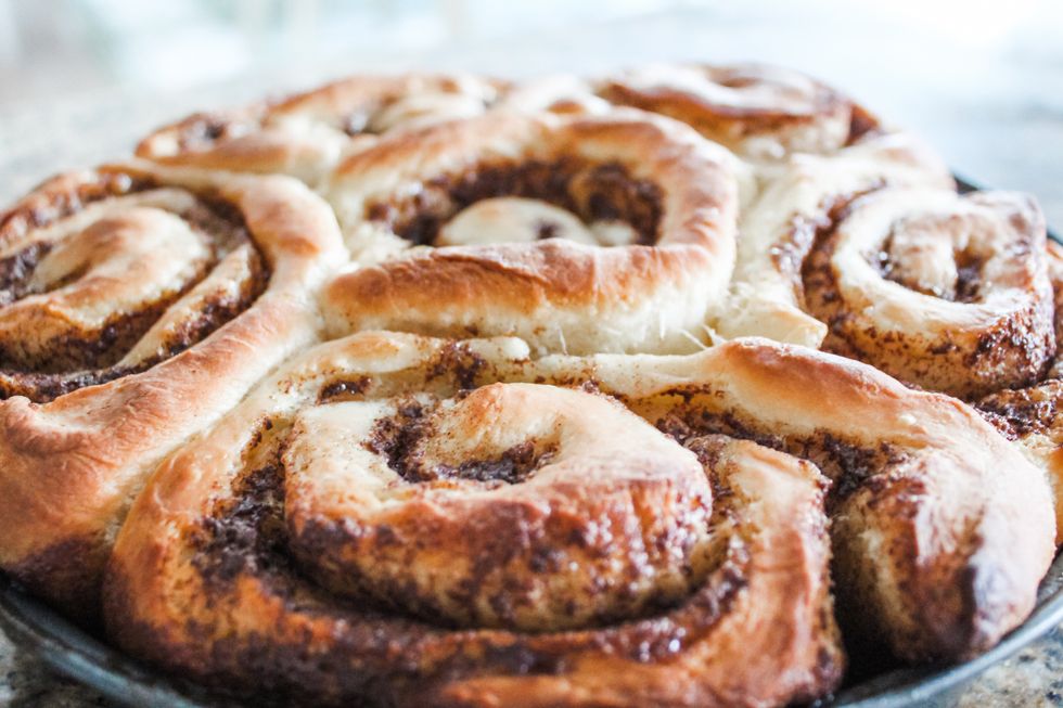 close-up of cinnamon rolls on a grey plate