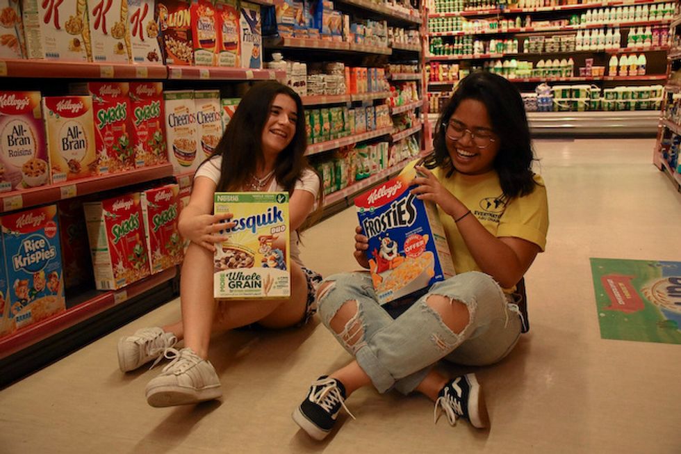 college girls shopping for groceries