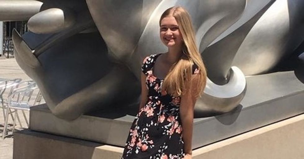 college woman wearing dress