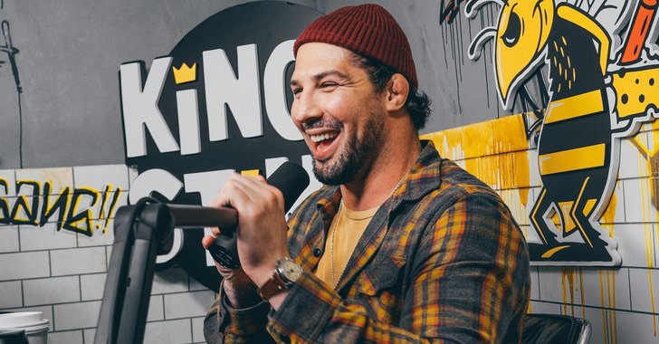 comedian at microphone