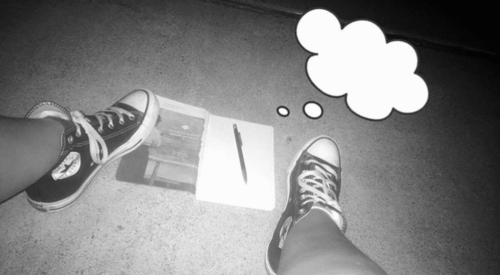 Converse and a notebook