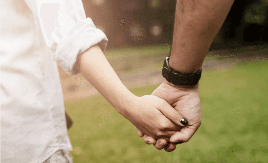 couple holding hands