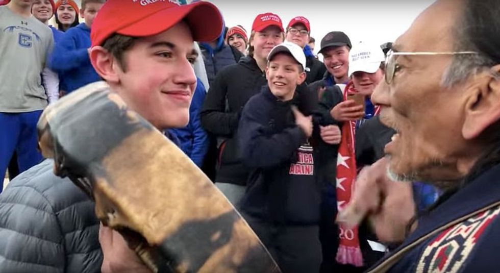 covington catholic school magateens confront native american vietnam veteran Nathan Phillips