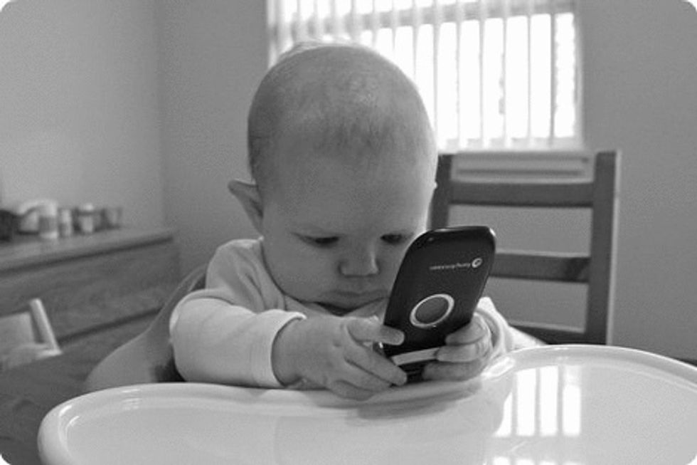Cute Baby with Phone