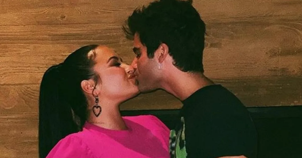 Demi Lovato and Max Ehrich kissing