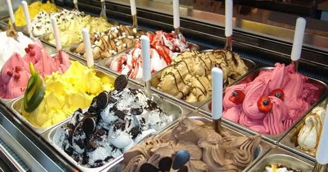 Different ice cream and gelato in a glass display