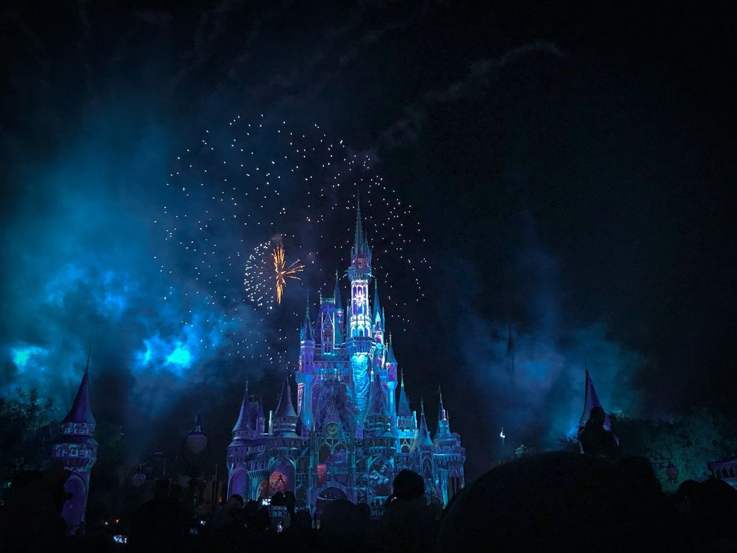 Disneyland castle with fireworks