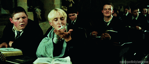 Draco Malfoy lets a bird fly away