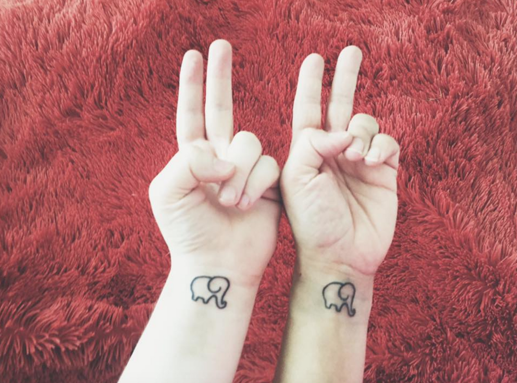 elephant wrist tattoo