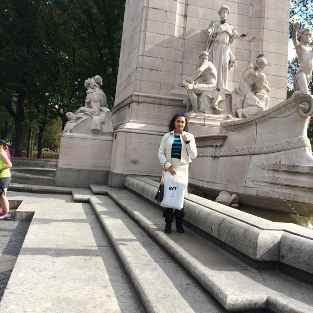 Erikka posing near a monument