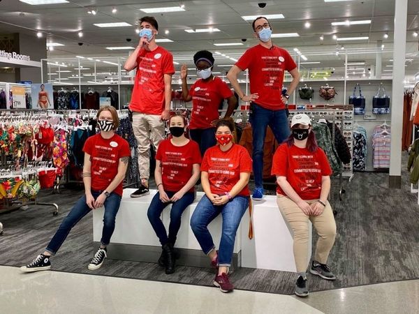 Essential workers wearing masks.