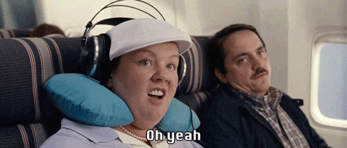 7 Ways to Survive Being a Middle Seat Passenger on an Airplane