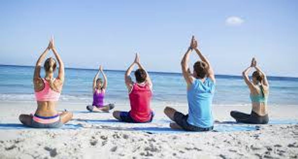 What You Need To Know About Experiencing Yoga On The Beach