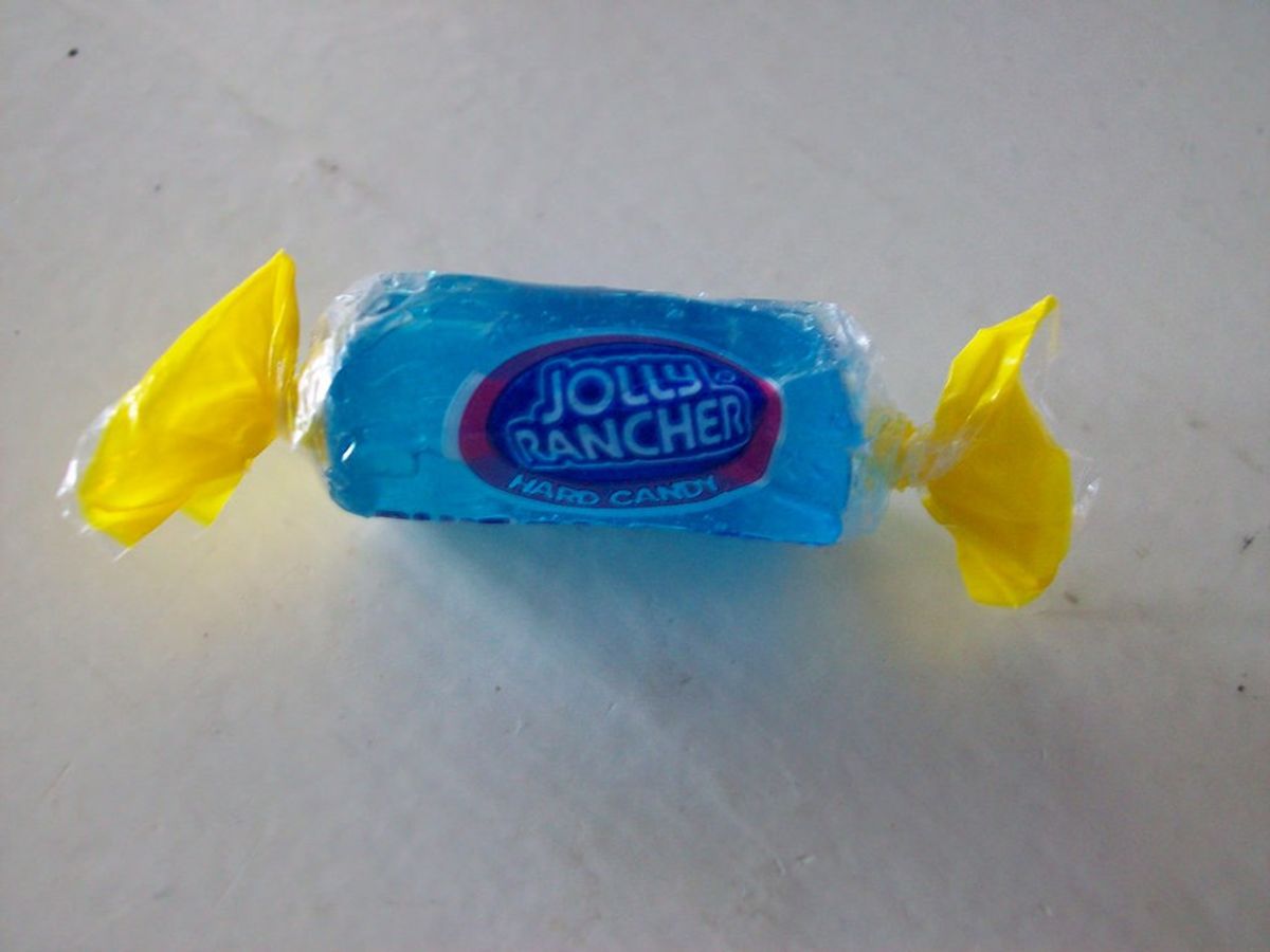 3 Blue Jolly Ranchers Surfing In A Sea of Ketchup