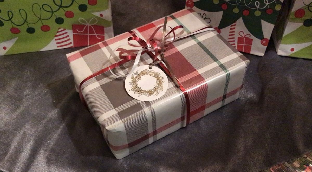 How To Wrap Christmas Presents Like A Pro