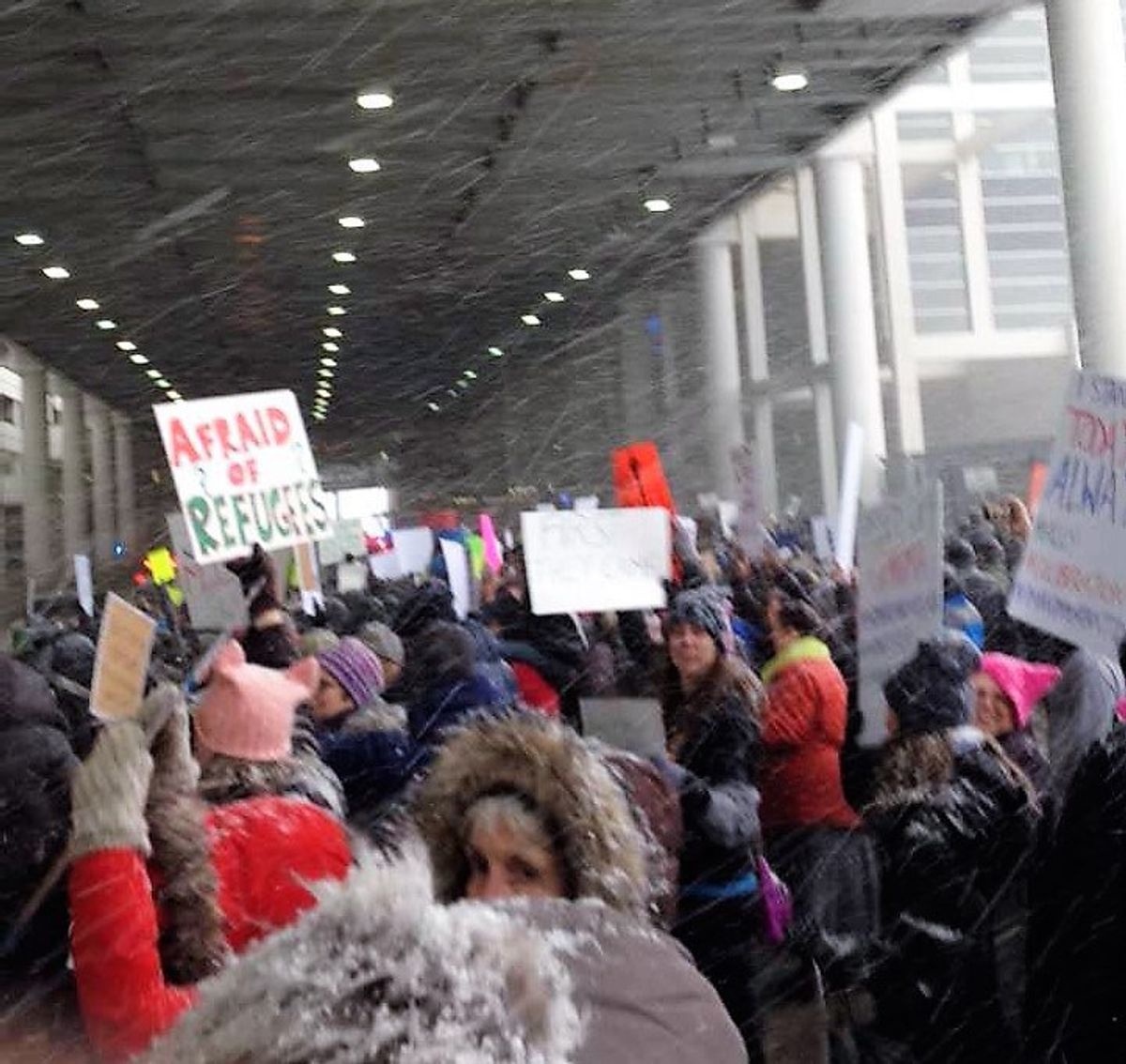 "You are welcome here," Shout Protesters at Detroit Metropolitan Airport