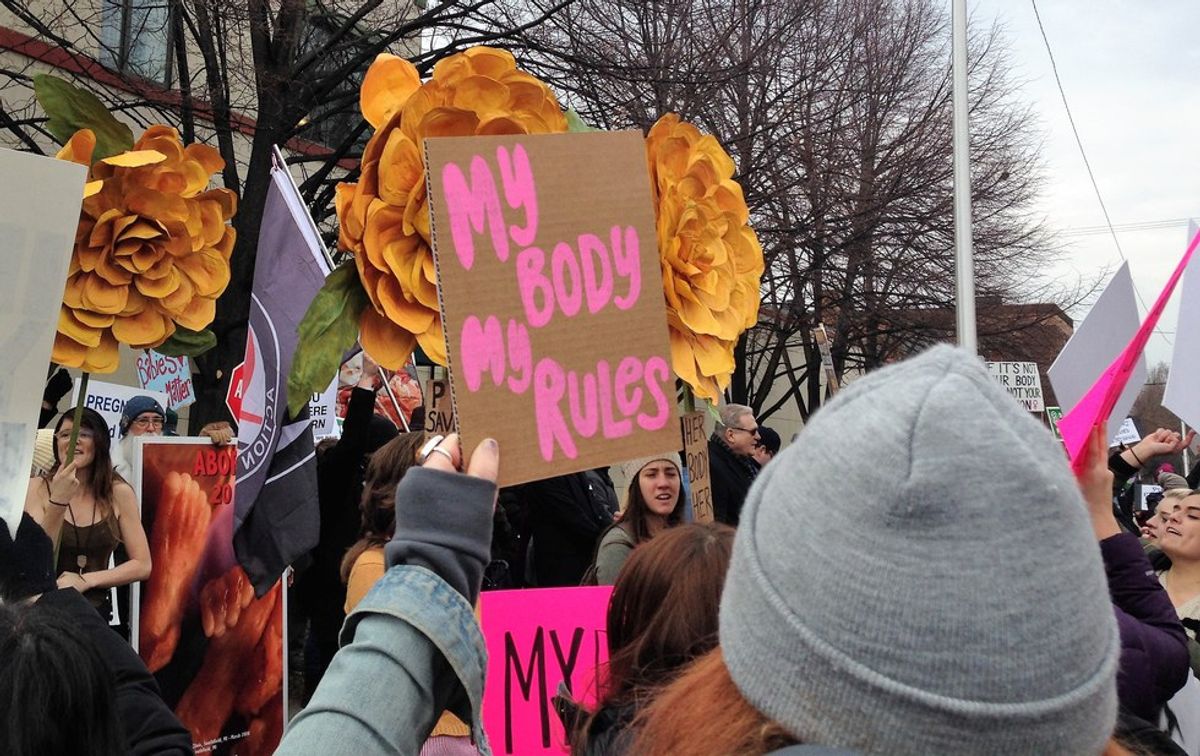 Protests to Defend or Defund Planned Parenthood Draw Hundreds in Detroit