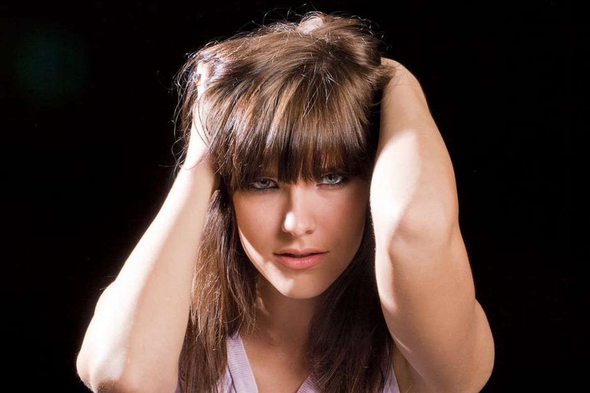 She Bangs, Or Does She? The Pros And Cons Of Getting Bangs