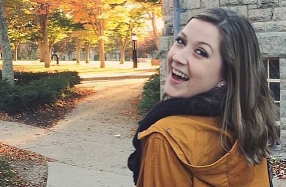 fall and winter clothing items hanging on rack