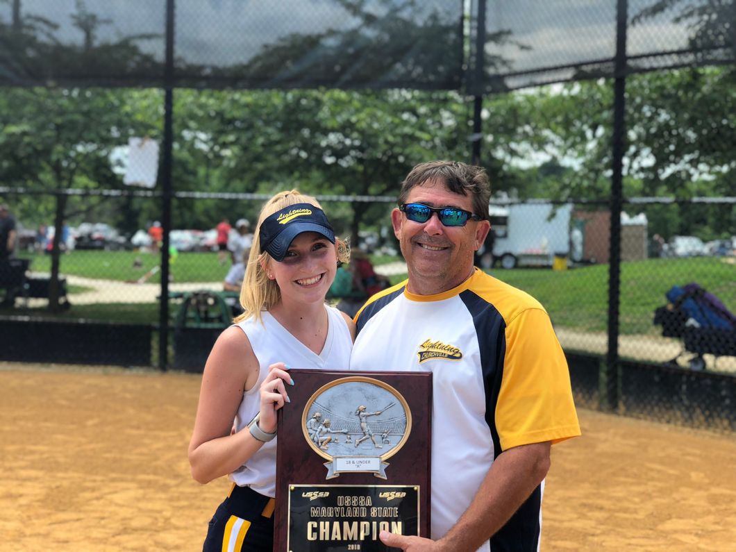father and daughter softball athletes